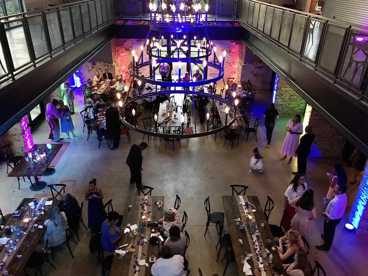 Colorful uplighting and gobo monogram at a venue